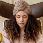 Huile de ricin et cheveux crépus : Une solution naturelle pour hydrater et définir les boucles.